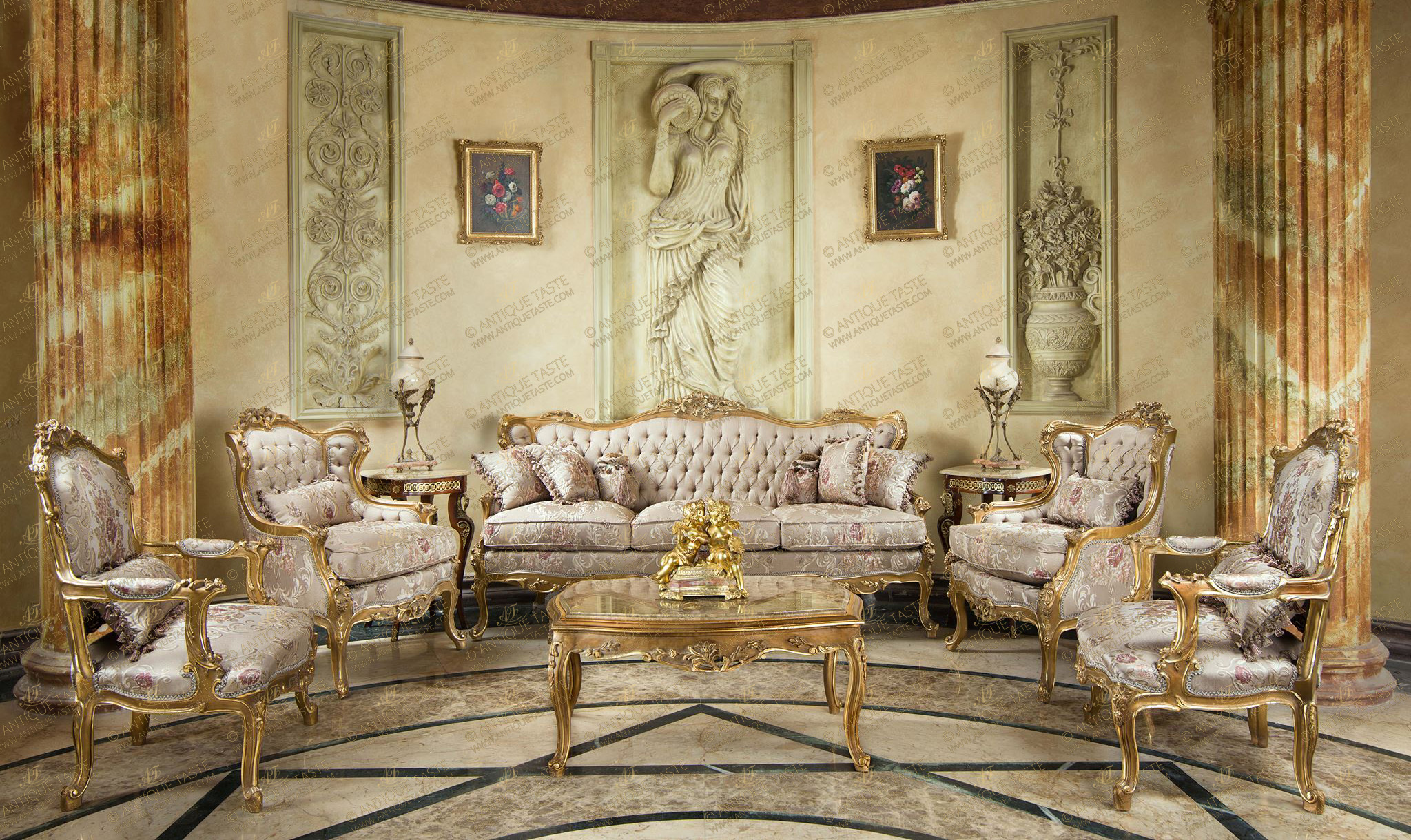 A sophisticated French Louis XV Rococo style six pieces Royal Grand Sofa Suite; comprising of one grand sofa, four armchairs, every pair of a different style and one marble topped center coffee table; meticulously hand carved, French foil gilded and patinated; upholstered in damask elegant fabric and tufted back; adorned with pierced floral carvings, acanthus leaves, scrolling foliate carvings and blossoming floral branches; raised on bold cabriole legs