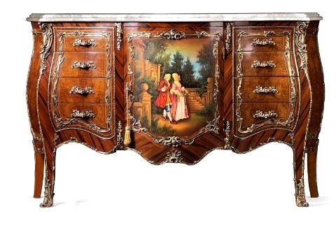 A Ritzy and high quality French Louis XV and Vernis Martin style ormolu mounted hand painted and veneer inlaid sideboard. The entire pieces is exquisitely sans traverse veneer inlaid with palisander and olive ash burl veneer inlays. The sideboard has elaborate and richly chased ormolu chutes with a top fanciful ormolu acanthus leaves mounts that lead down to ormolu acanthus sabots. Raised on splayed cabriole legs with impressive scrolling ormolu leafy strip-works that continue onto the scalloped apron, sides and all over the piece. The central part with attractive door hand painted with a romantic court scene flanked with four drawers to each side. Topped with a beveled arbalest shaped marble top