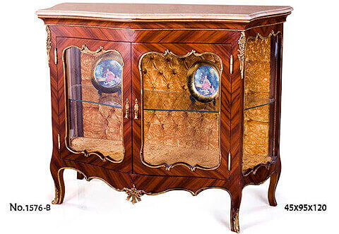 A very attractive French Louis XV style ormolu-mounted sans traverse veneer inlaid Grand Cabinet Vitrine De Salon after the model by François Linke, with double large doors, marble topped and gracefully ornamented with delicate ormolu filet to the contour with acanthus works, upholstered with velvet tufted back. Available in two versions as displayd