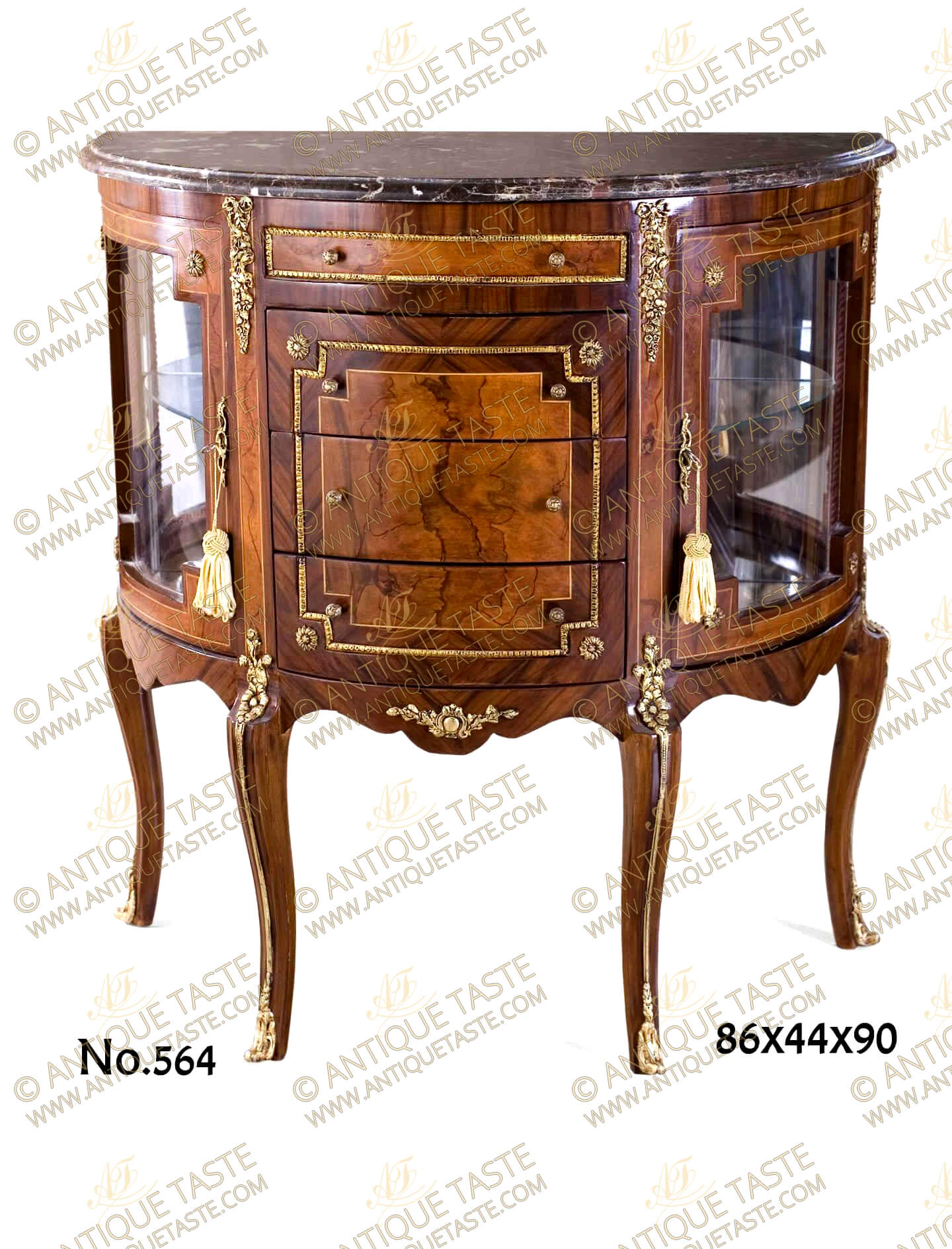 A decorative French Louis 15th style ormolu-mounted Demilune shaped Display Cabinet; veneer inlaid in two types of veneers, with two doors and four drawers, decorated with ribbon tied blossoming chutes, ormolu moulded encadrements and ormolu sabots.