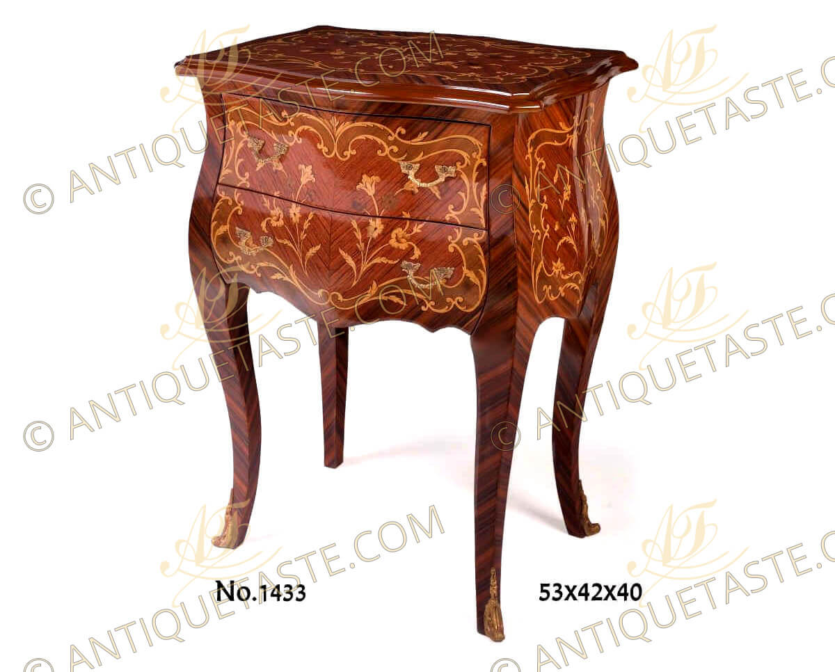 A simple French Louis XV style ormolu-mounted sans traverse floral marquetry and palisander veneer inlaid Chest of Drawers