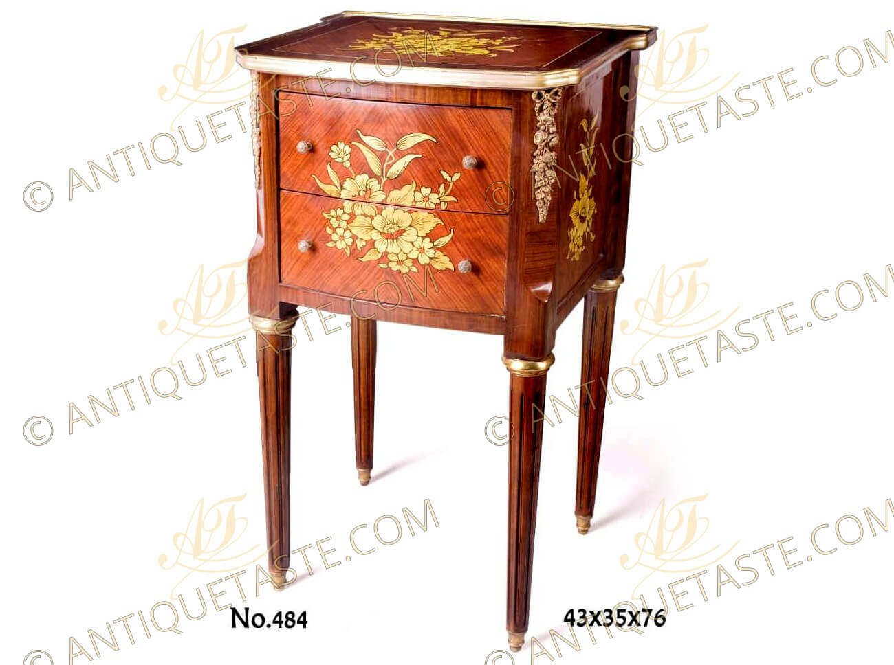 A French Louis XVI style ormolu-mounted foliate marquetry and veneer inlaid two drawers Night Stand; ornamented with flower bouquet marquetry patterns and ribbon tied ormolu chutes