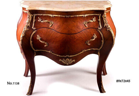 A fabulous French Louis XV style ormolu-mounted veneer inlaid and marble topped curved shape Chest of Drawers; beautifully adorned with fine chased ormolu of blossoming foliate mounts and leafy works; the fine piece is resting on splayed legs ornamented with acanthus pierces sabots