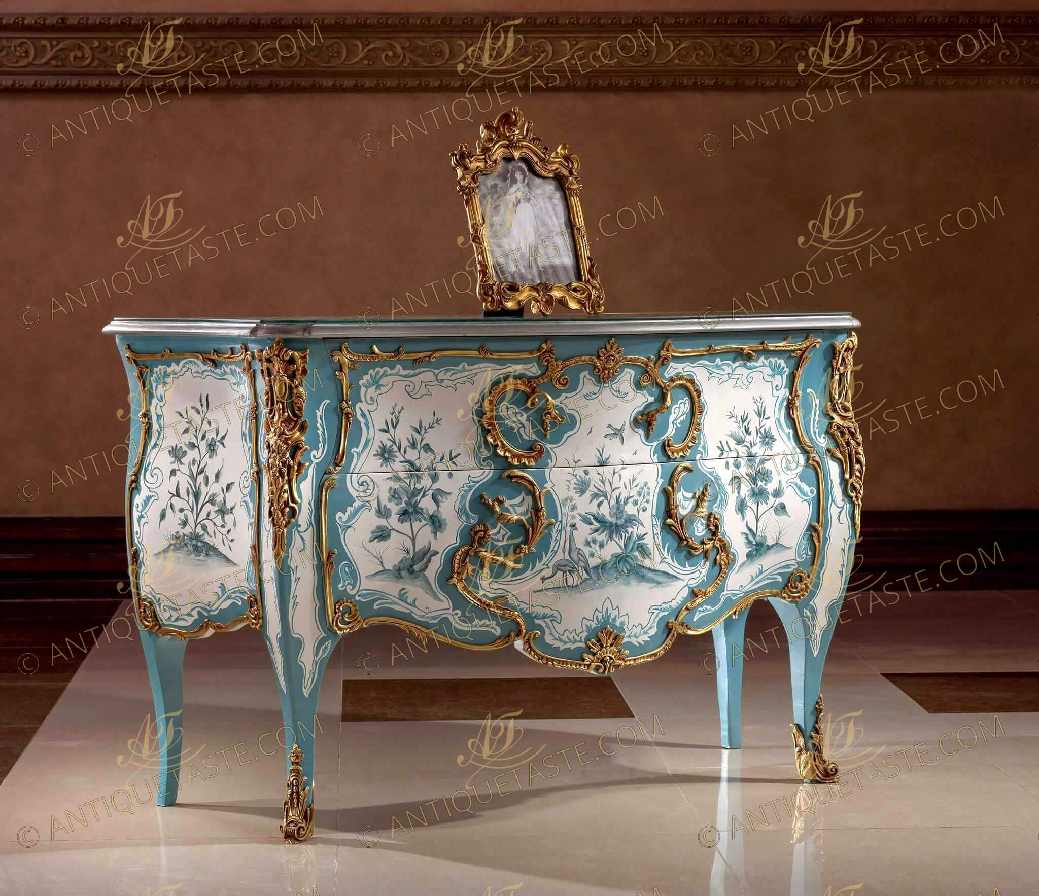 XVIIIth century Louis XV Rococo Vernis Martin style ormolu-mounted bleu et blanc commode galbée of Madame de Mailly after the model by master Mathieu Criaerd Circa 1742, Paris, now located in Louvre Museum, The fine piece with serpentine shaped eared moulded top above two conforming twp long deep drawers professionally hand painted by our artisans as the original piece with equatorial fauna and floral pattern within a highly chiseled and burnished gilt-ormolu foliate trimmed border issuing Rococo motives of shell C scrolls, branches and leaves with leafy ormolu handles emerged from the decoration, Each corner with exquisite large pierced ormolu foliate chutes terminating with extraordinary volute wrap around foliate ormolu sabots covering the cabriole legs, The sides has the same movements