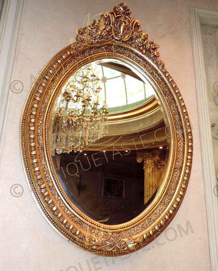 Oval French Mirror with Carved Gilt Wood Frame Oval French Mirror with Carved Gilt Wood Frame