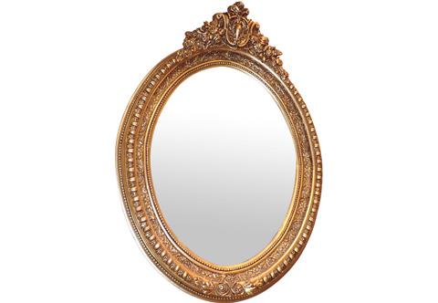Early 18th century Louis XIV style hand carved, French foil gilded and patinated Wall Oval Mirror