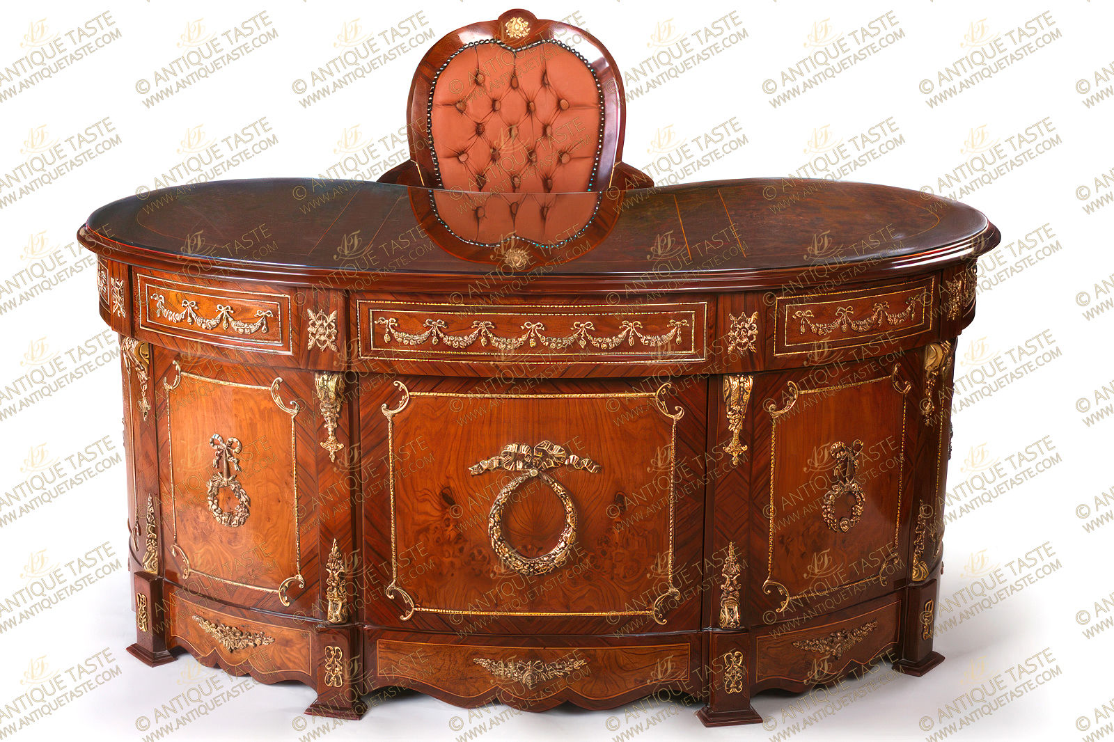 A Graceful French Neoclassical Style Mahogany And Veneer Inlaid