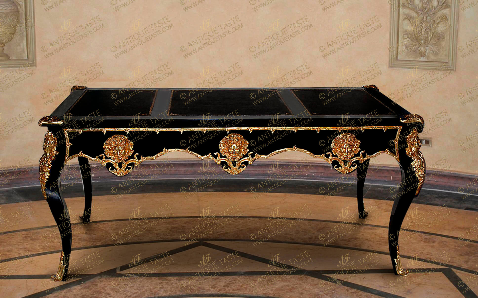 French Louis XV period style gilt-ormolu-mounted black lacquered grand Executive Writing Desk; The three sectional inset gilt-tooled leather top cornered with finely chiseled ormolu clasps. The apron below has three scalloped shaped drawers, bordered with hammered foliate ormolu filets in a satin and burnish finish and each drawer is ornamented with a detailed fine cast gilt-ormolu Satyr Mask, The central drawer with ormolu keyhole escutcheon; The desk is raised on four cabriole legs each is topped with gilt-ormolu female bust on foliate chutes body and terminated with ormolu acanthus volute sabots; The sides and back have the same design and mounts of the front. The desk is available in other finishing and silvered ormolu casting. The fine desk is also available in different sizes per request 160cm, 180cm and two meters width.