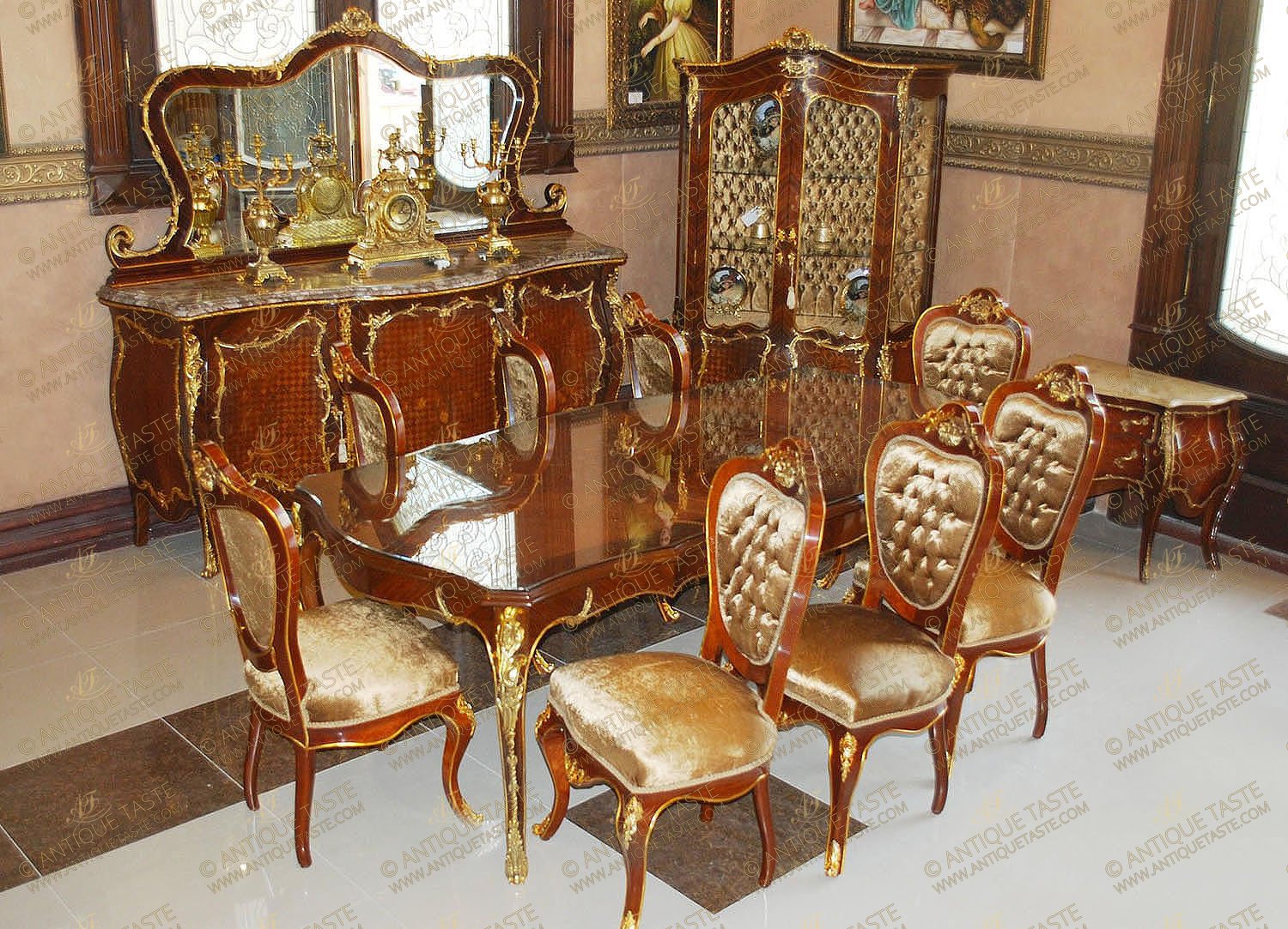 An alluring French late 19th Century Louis XV style eleven pieces luxury Dining Room Set after the model by François Linke, sensationally ormolu-mounted with finely chiseled scrolling foliage, waterfall, cresting, acanthus leaves, swaging garlands, hammered ormolu bands and sophisticated pierced ormolu works; inlaid in double sans-traverse veneer, foliate marquetry patterns and harmonious diamond parquetry; comprising of a dining table, eight dining chairs, buffet with mirror and china cabinet.