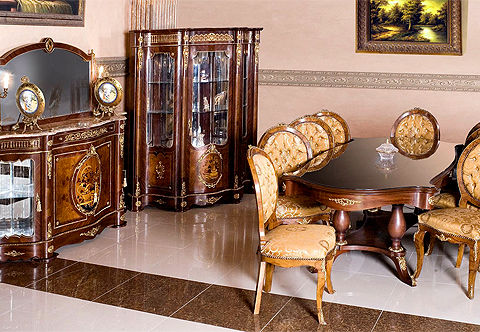 An impressive French Napoleon III Louis XV Revival style eleven pieces luxury Dining Room Set; comprising of one pedestal dining table with shelf X stretcher, eight dining chairs finely inlaid in the precious olive root veneer, one buffet with mirror and one display cabinet; the beautiful set is inlaid in double sans-traverse veneers and fine marquetry designs of ewers and flower bequests; skillfully ormolu mounted with scrolling Rinceau style foliate mounts, ribbon-tied laurel-wreath medallions surmounted by anthemion radiating petals, ormolu galleries, leaf-and-dart ormolu bands, scrolling pierced scalloped cresting acanthus mounts, royal ormolu chutes, oval and circular rosettes and acanthus leaves scrolling foliate mounts.