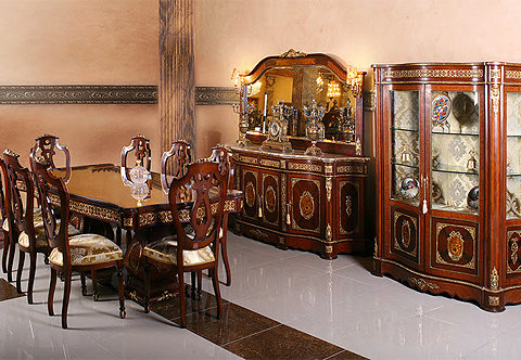 A captivating French Napoleon style eleven pieces luxury Dining Room Set; intricately and extensively ormolu-mounted with double guilloche, scrolled Rinceau shaped foliate movements, acanthus spinosus leaves, different ormolu bands of leaf-and-dart, egg-and-dart, ribbon-tied medallions, acorn finials, rosettes, large pierced acanthus chutes, cresting, olive-bay-leaves, X bands and foliate keyhole escutcheons; inlaid in double sans-traverse quarter veneer and exceptional floral marquetry designs; the fine set is comprising of one dining table, eight dining chairs, grand buffet with mirror and grand upholstered back display cabinet.