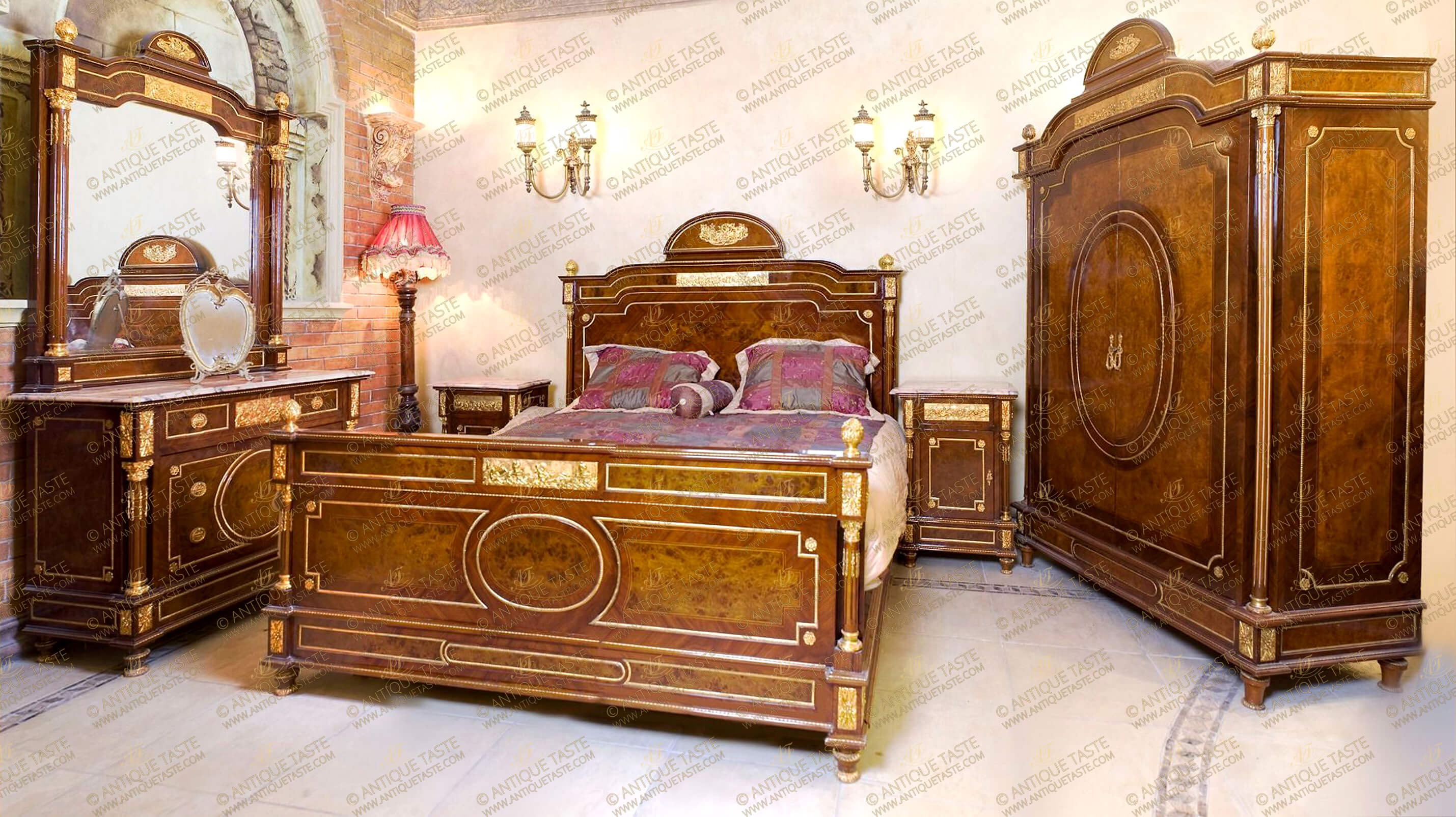 A ritzy French Louis XVI Neoclassical style ormolu-mounted and double veneer inlaid hand crafted Master Bedroom Set, representing the typical Louis XVI Neoclassicism period; constructed of solid walnut wood as all our products with domed shape and ornamented with Corinthian style ormolu capitals, ormolu rosettes, trims, chandelles in the flutes, ormolu acorn finials and ormolu beaded bands; the royal set is comprising of one bed, one armoire, one dressing chest and two nightstands.