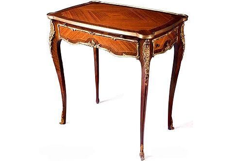 French Louis XV style ormolu-mounted sans-traverse quarter veneer inlaid side drawer and a sliding writing panel Ladies writing Table after the model by François linke