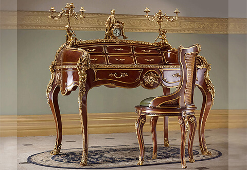 French Louis XV Rococo style ormolu-mounted veneer inlaid Bureau de dame; Ladies Secretary Desk; The luxurious piece is inspired from the original models of François Linke and Theodore Millet Ladies Desks; The upper structure is fitted with six ormolu mounted drawers surmounted by a finely chased central ormolu clock flanked by two putti holding four arms leafy candelabras; the whole upper structure is surmounted with artistically moulded blossoming acanthus leaves encardment connecting on each corner by a large male and female ormolu blossoming leafy scrolling espagnolettes extended on each elegant cabriole leg by hammered leafy bands connected to voluting acanthus-wrapped sabots, The harmonious scalloped shaped apron ornamented by a central breath-taking large Rocaille style shell adorned with acanthus leaves flanked by two drawers with ormolu leafy handles. The whole bureau is decorated with delicate leafy ormolu filet in a satin and burnish finish continued all around the contour
