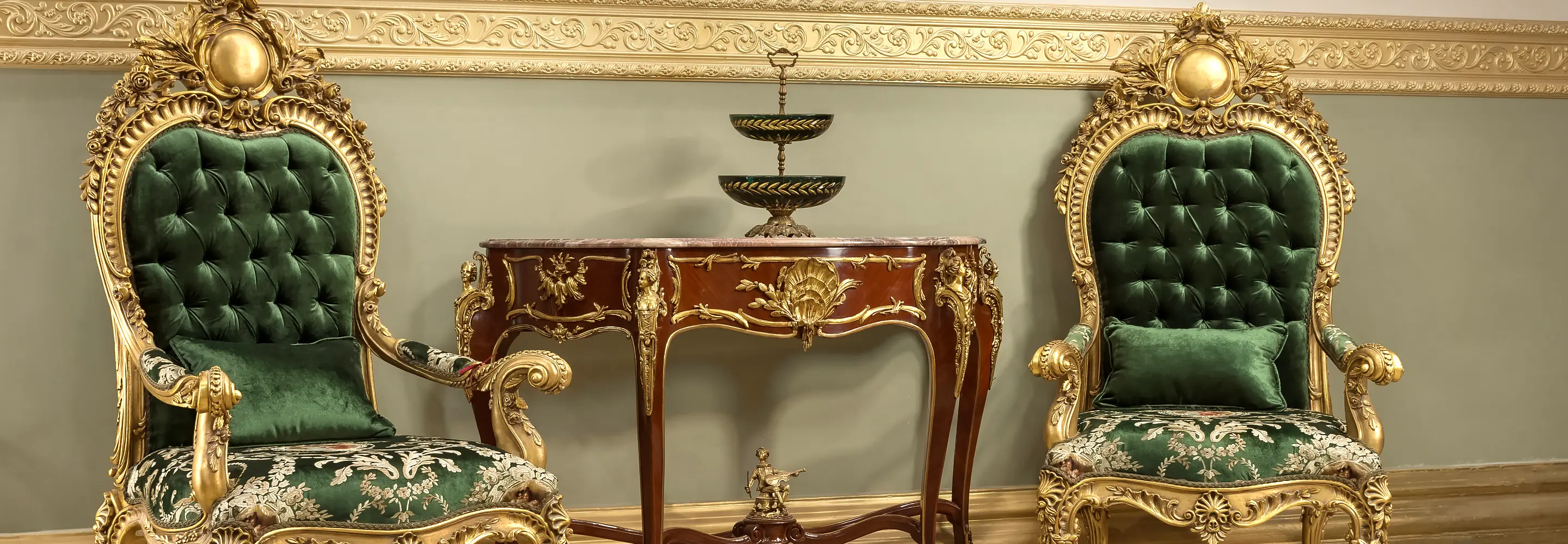 A masterful expression of Louis XV menuiserie, featuring monumental hand-carved and gilded armchairs for an atmosphere of historical continuity.