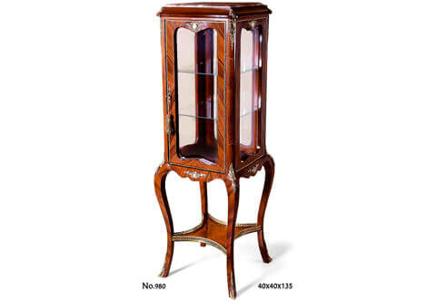 A sophisticated French Louis Quinze style patinated ormolu-mounts and sans-traverse double cut veneer inlaid grand Vitrine Pedestal; The surmounting inset marble top rests within a concave shaped frieze ornamented on each corner with an ormolu acanthus leaf, all above the display tier of two glass panes inside and four scalloped shape glazed panels adorned on top center of each of them with a finely chiseled foliate ormolu Cartouche and delicate ormolu frame, the central door has an ormolu pierced foliate keyhole escutcheon, the four corner supports are double veneer inlaid within a delicate filet and ornamented on top with stunning ormolu long chutes representing suspending ribbon-tied pierced foliate ovoid Cartouche; The lower supporting table has a fine double scalloped shaped reserve sans-traverse veneer inlaid and centered on each side with an ormolu mount of a Cartouche issuing foliate branches; each leg corner is embellished with a fine long scrolling acanthus leaf ormolu chutes connecting the upper and lower tiers; The fine piece is raised on four robust splayed cabriole legs, sans-traverse veneer inlaid, ormolu mounted with pierced scrolling foliate ormolu sabots and connected with an exquisite double veneer inlaid concave sides X stretcher ornamented with a doubled smooth and burnished ormolu band surmounted with a pierced gallery to each side.