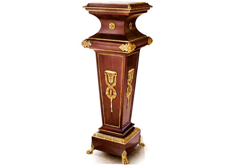 Paul Sormani style pedestal, Louis XVI Neoclassical style Stand, Louis XVI Pedestals, Neoclassical style Vase stand, Louis XVI Paul Sormani style Pedestal, Luxurious Pedestals, Jean-Henri Riesner Pedestal, Francois Linke Pedestal, Maison Millet Pedestal, Corners Decoration, French style Stand, Andres Charles Boulle Pedestal, Theodore Millet Style Pedestal, Robert Adam style Vase Stand, Empire Style Pedestal, Vitrine Stands, Louis XV style Pedestals, Bombe Shape Stand, Louis XVI Pedestals, Ormolu-mounted Stand, English style Pedestal, Empire style Pedestal, George III style Pedestals, Heritage Pedestals, Display Stands, glamorous and monumental French Louis XVI Neoclassical style gilt ormolu-mounted reddish brown veneer inlaid Pedestal on the manner of Paul Sormani, The inset marble top in stepped double ormolu bordered platform and acanthus leaf cornered, above a concave shaped neck adorned in center with a flower rosette, the astragal below in a convex form ormolu decorated with a large double acanthus leaf to each corner and with ormolu bands up and down, The tapering form recessed body below is framed to each side with a hammered ormolu encradement and centered with exquisitely chiseled large royal gilt ormolu mount of  hanging papyrus issuing knotted swaging imbricated bay leaves, the body ends in a fluted ormolu rimmed base resting on square plinth surmounted with a fine cast Acanthus Cyma Reversa ormolu trim and raised on intricately finished leafy paw feet sabots