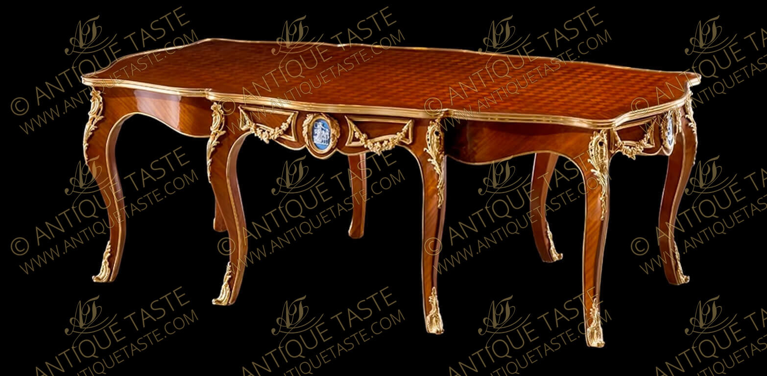 French Louis XV style ormolu-mounted Parquetry and blue Wedgwood Jasperware plaque inlaid eight legs Table De Salon after the model by François Linke late 19th century.