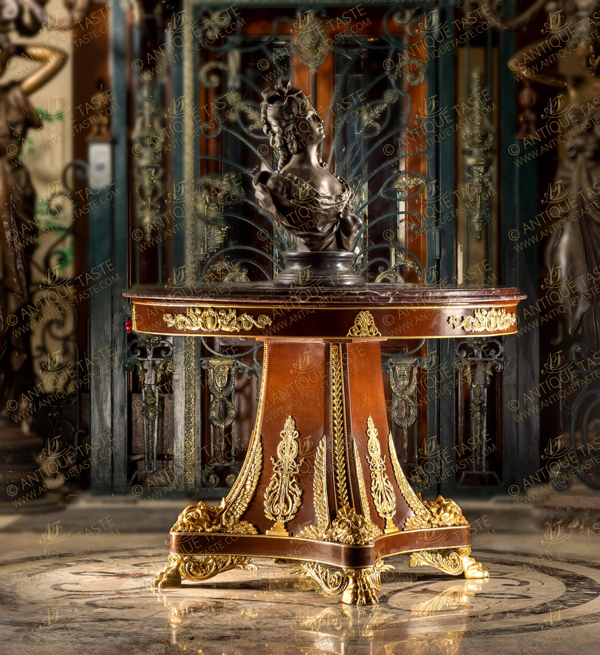 A Majestic and extremely decorative Napoleon III second Empire style ormolu-mounted veneer inlaid and marble topped Center Table richly adorned with luxuriously chased ormolu mounts, resting on striking acanthus paw feet topped with triangular base and central support displays an exceptional curved tapered design ornamented with Empire Neoclassical ormolu mounts leading to the marble topped ormolu mounted circular top
