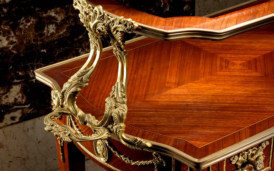 display cabinet adorned with ormolu horses