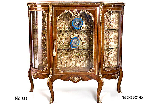 French Louis XV patinated-ormolu-mounted sans traverse double veneer inlaid marble topped capitonné upholstered interior demilune shaped Display Cabinet
