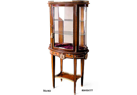 French Louis XVI style ormolu-mounted veneer inlaid oval shaped Vitrine de Milieu after the model by Paul Sormani Circa 1870